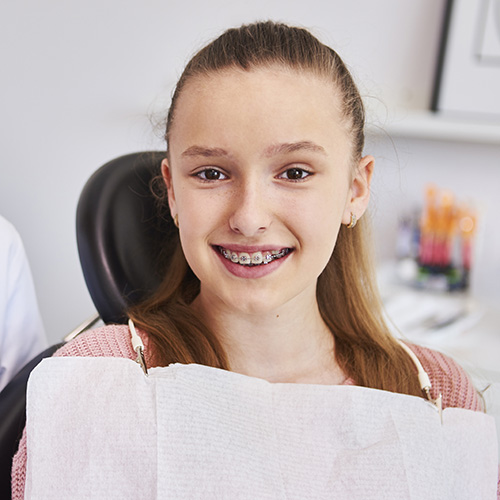 Girl in dentist's chair - Renton Orthodontist, Burien Orthodontist