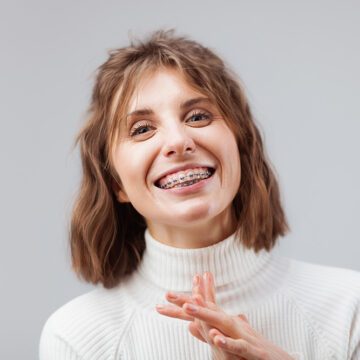 Woman smiling with braces